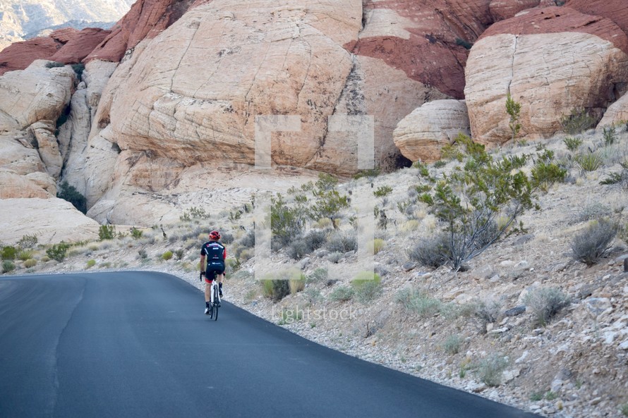 bike rider on the scenic loop of Red Rock Canyon 