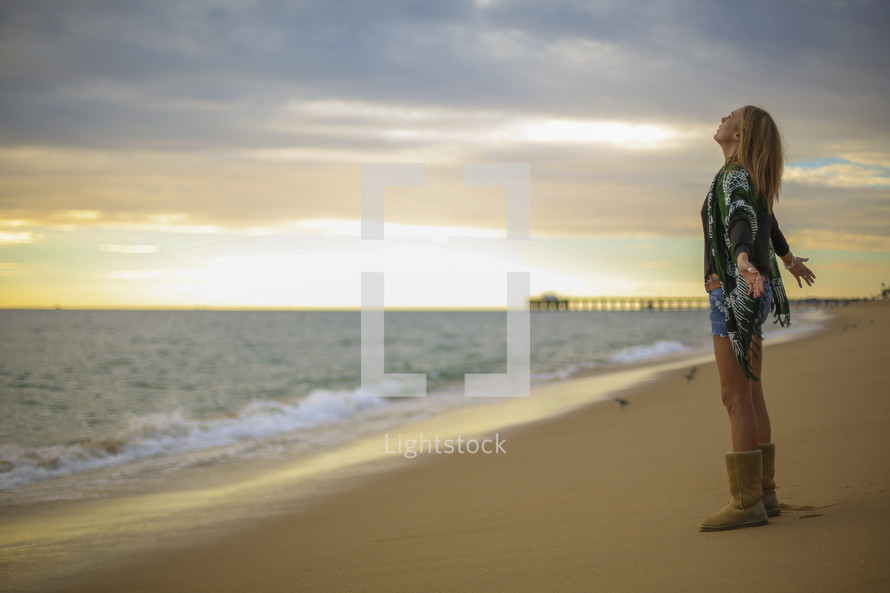 woman standing on a beach