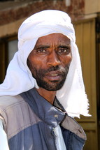 Arab trader wearing traditional head wear [For similar search Ethnic Face Smile]