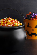 candy in trick-or-treat buckets 