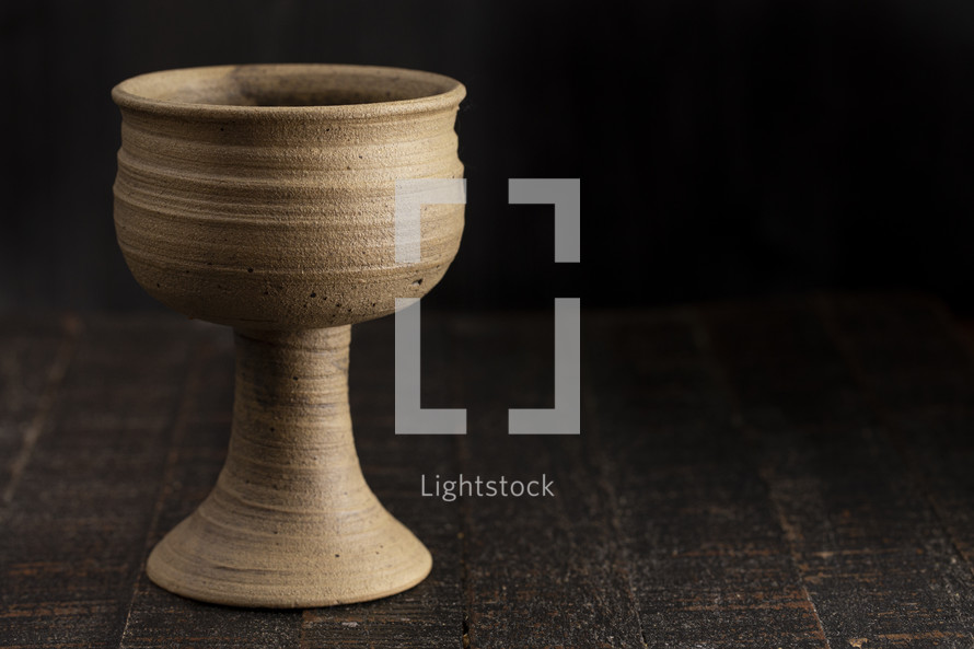 chalice on a wood background 