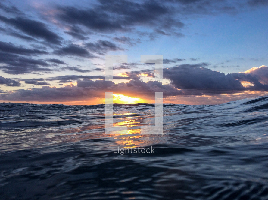 ocean surface at sunset 