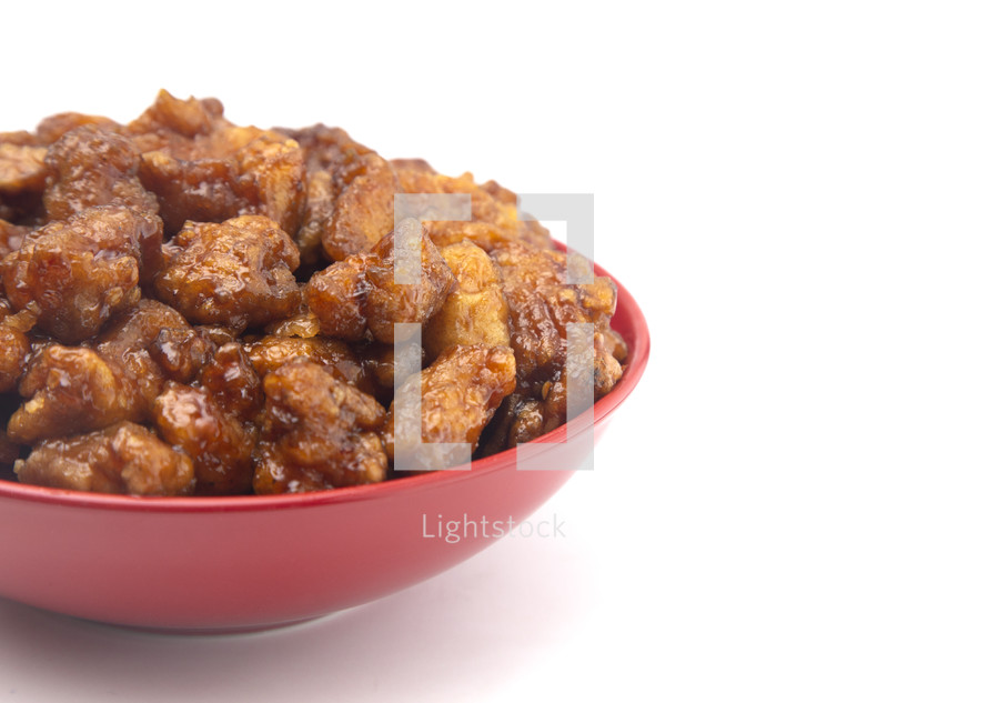 Sauced Coated Fried Chicken in a Red Bowl