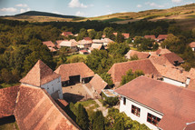 tile roofs of homes in a valley 