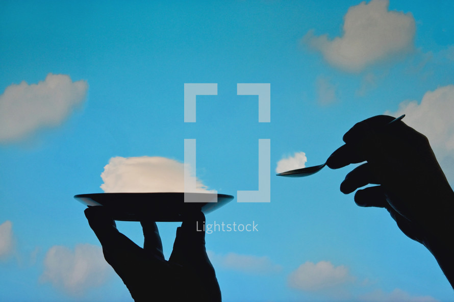 Abstract Tasty Slice of Cake from Clouds In A Blue Sky