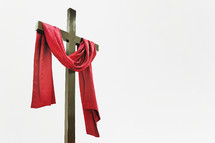 red shroud on a cross