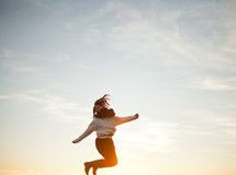 A woman jumping in the air