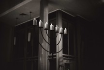 candelabra in a dark room 