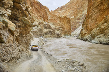 truck driving on rugged terrain 