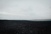 gravel and black dirt landscape 