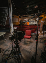Lights and camera on church documentary set. 