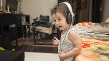 toddler boy with headphones 