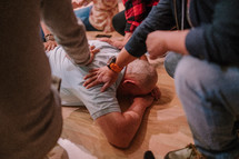 lying on the floor in tears during a worship service 