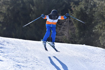 Young Skier Soaring Through the Air