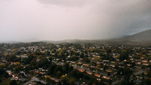 aerial view over neighborhoods in a suburban community 