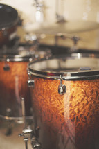 a shallow focus shot of drum kit