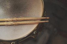 a close up of shredded drum sticks and snare