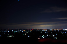 bokeh lights from a distant suburb at night