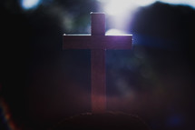 sunlight on a wooden cross