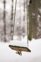 snow on a swing 