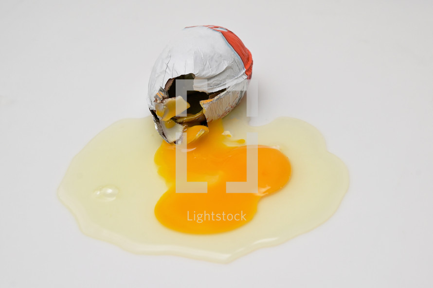 Abstract Cracked Egg With Yolk from A Chocolate Surprise Egg