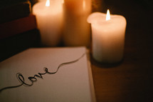 word Love and candles 