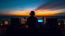 Silhouette of a dj who is putting music at sunset on a beach. AI Generative