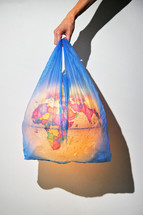 Concept Of Woman Holding Earth Globe Covered with Plastic Waste Pollution