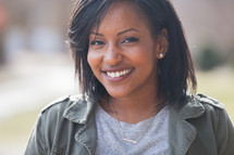 headshot of a smiling African American woman