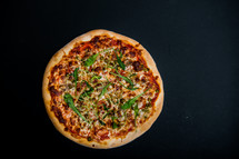 pizza on a black background 