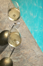 Closeup Summer White Wine Glass near pool