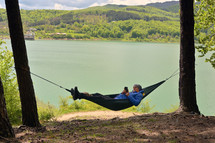 young man resting in a hammock 