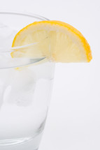 slice of lemon on a glass of water 
