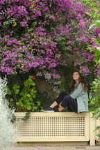 teen girl portrait and bougainvillea flowers in botanical garden
