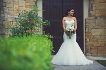 a beautiful Latino bride in her wedding gown 