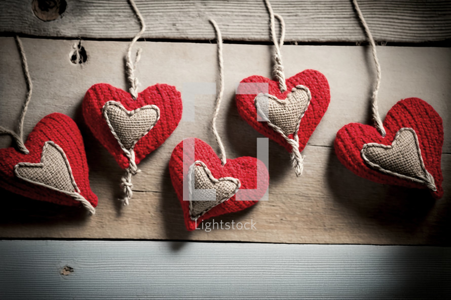 Red and white knitted hearts