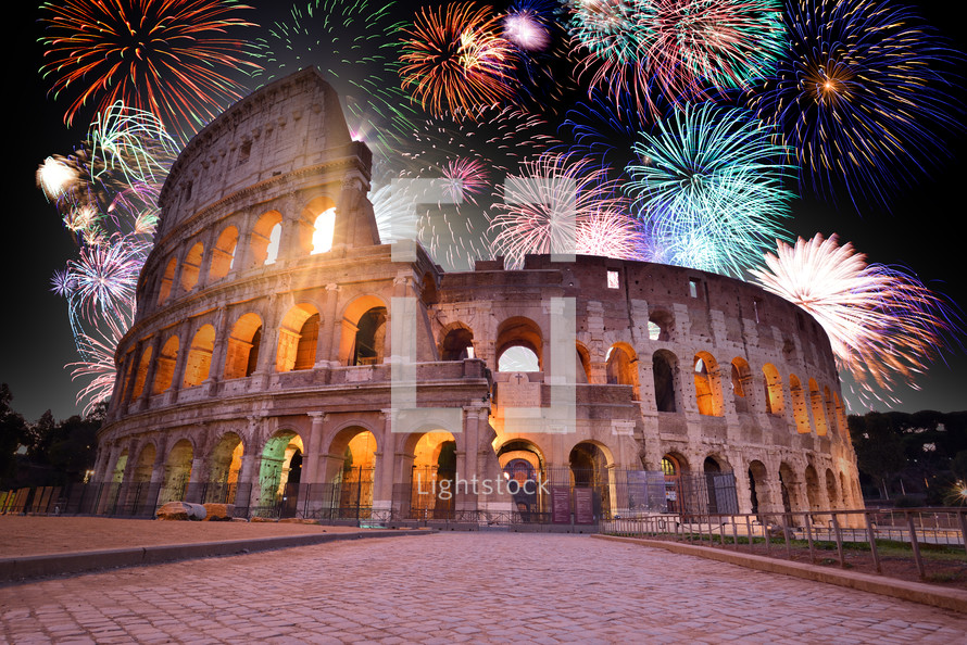 Colorful Fireworks above the Colosseum in Rome, Italy. Celebrating New Years Eve