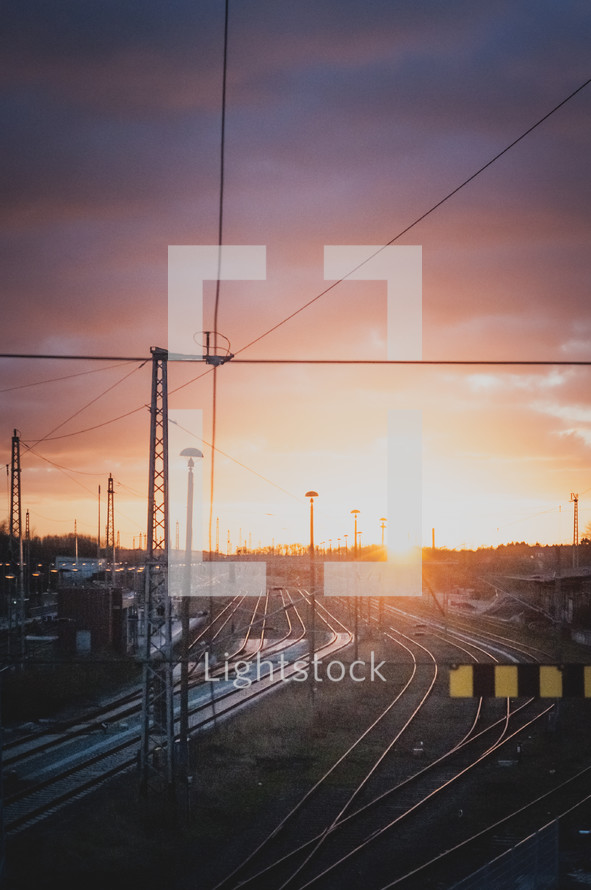 train tracks at sunset 