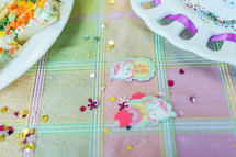 confetti on a pastel tablecloth 