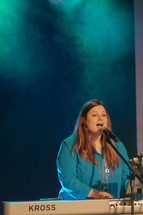 musicians on stage performing worship music 