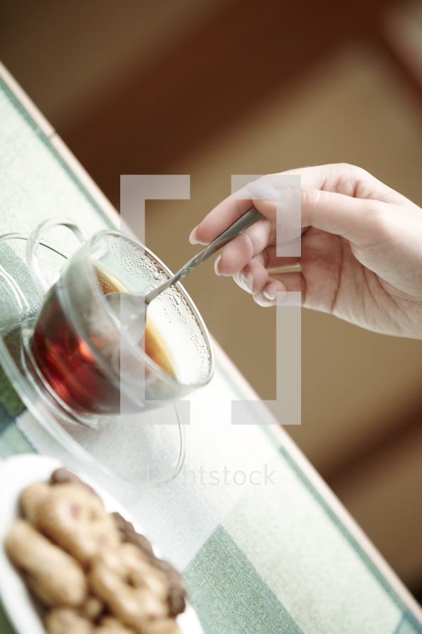 a woman making tea