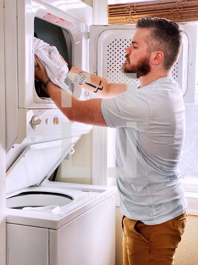 a man doing laundry 