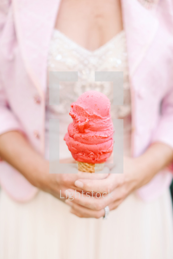 woman holding an ice cream cone 