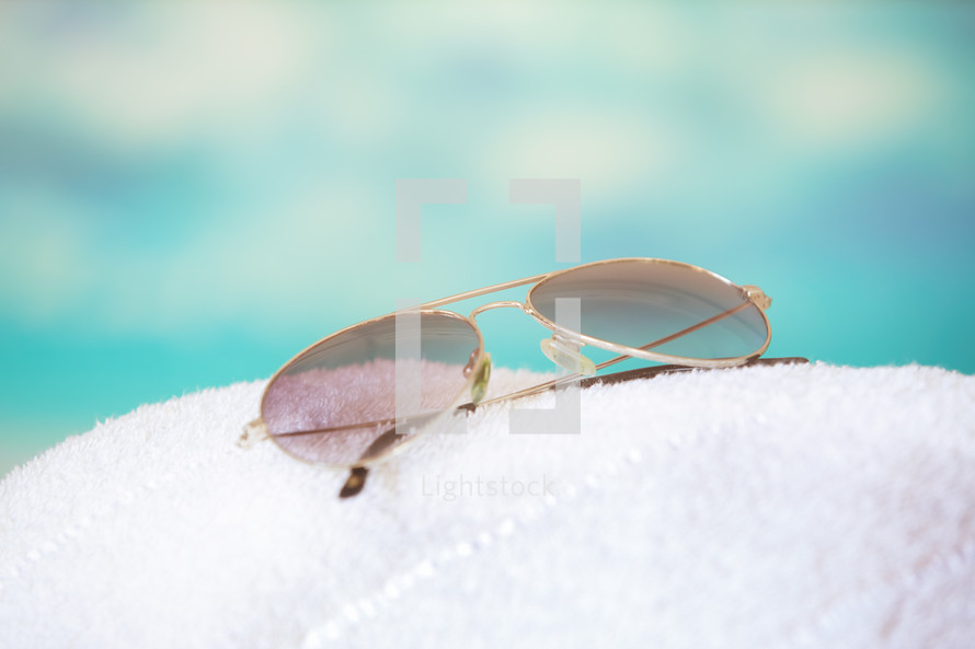 sunglasses on a towel 