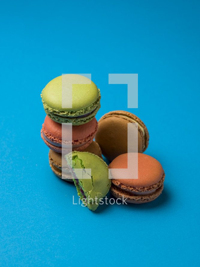 macaron cookies on a blue background 