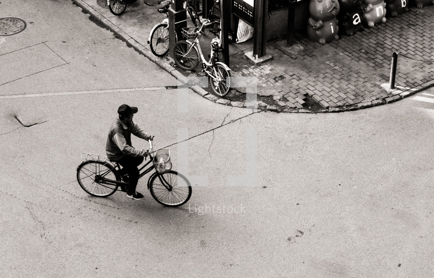 man riding a bicycle in China 