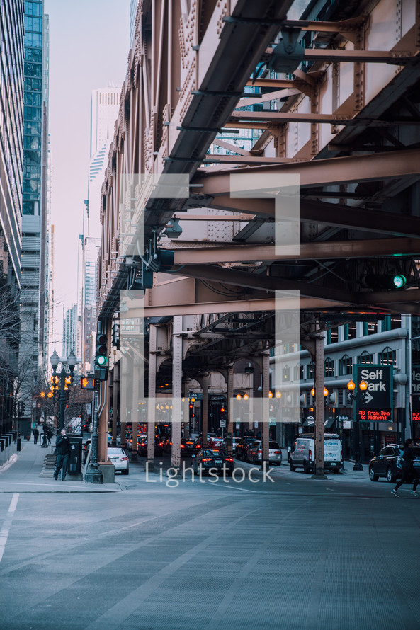 cars under a bridge in Chicago 