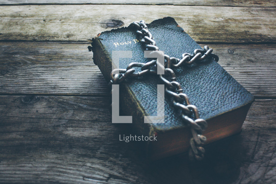 chains around a Bible 