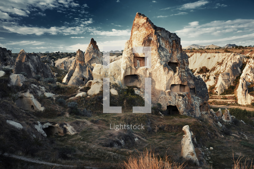 homes carved into a mountain rock of Cappadocia, Turkey