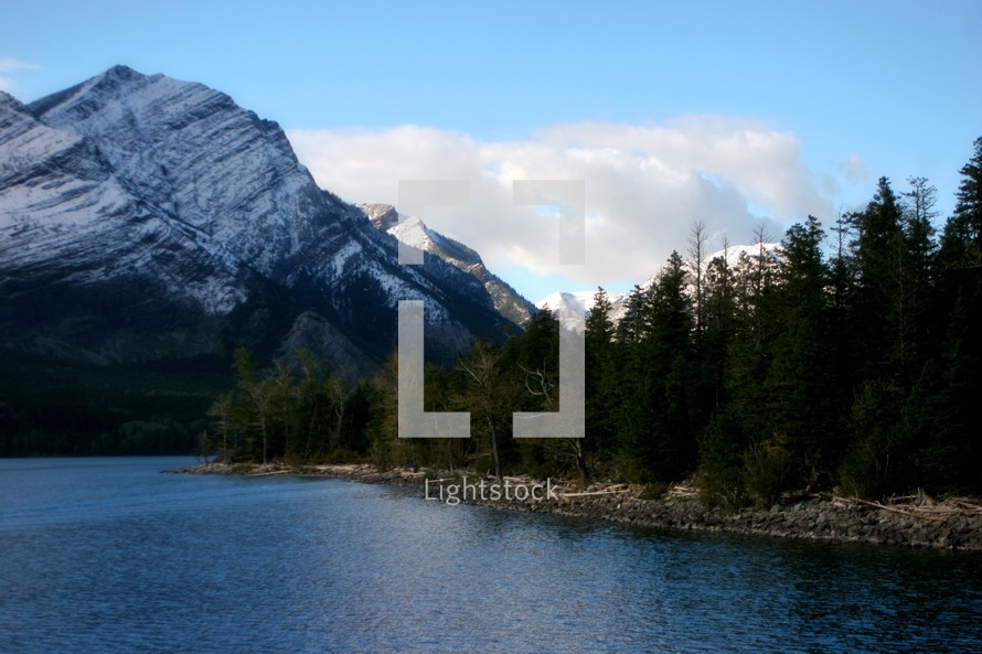 mountain peak and a lake 